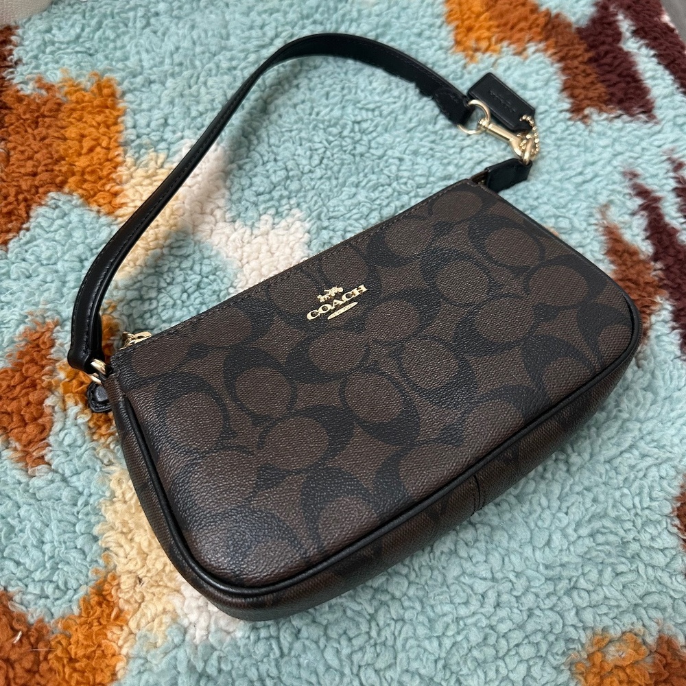 Coach Nolita 19 in signature canvas